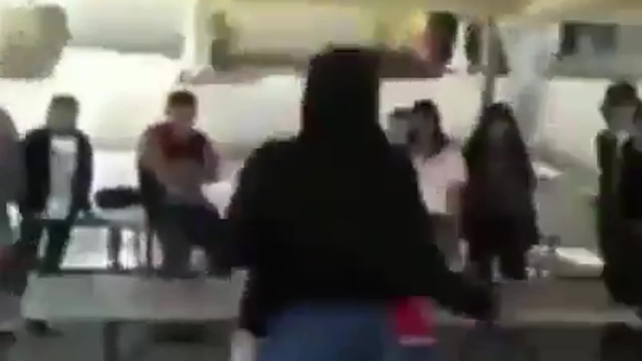 Rollin 40’s crip protects a student getting jumped