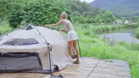 Pretty girl camping alone, eating hot pot and sleeping overnight in a beautiful field