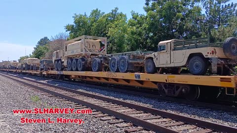 Train Hauling Military Hardware.