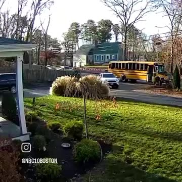 S A RED LIGHT AND THE SCHOOL BUS IS PICKING UP THE KID