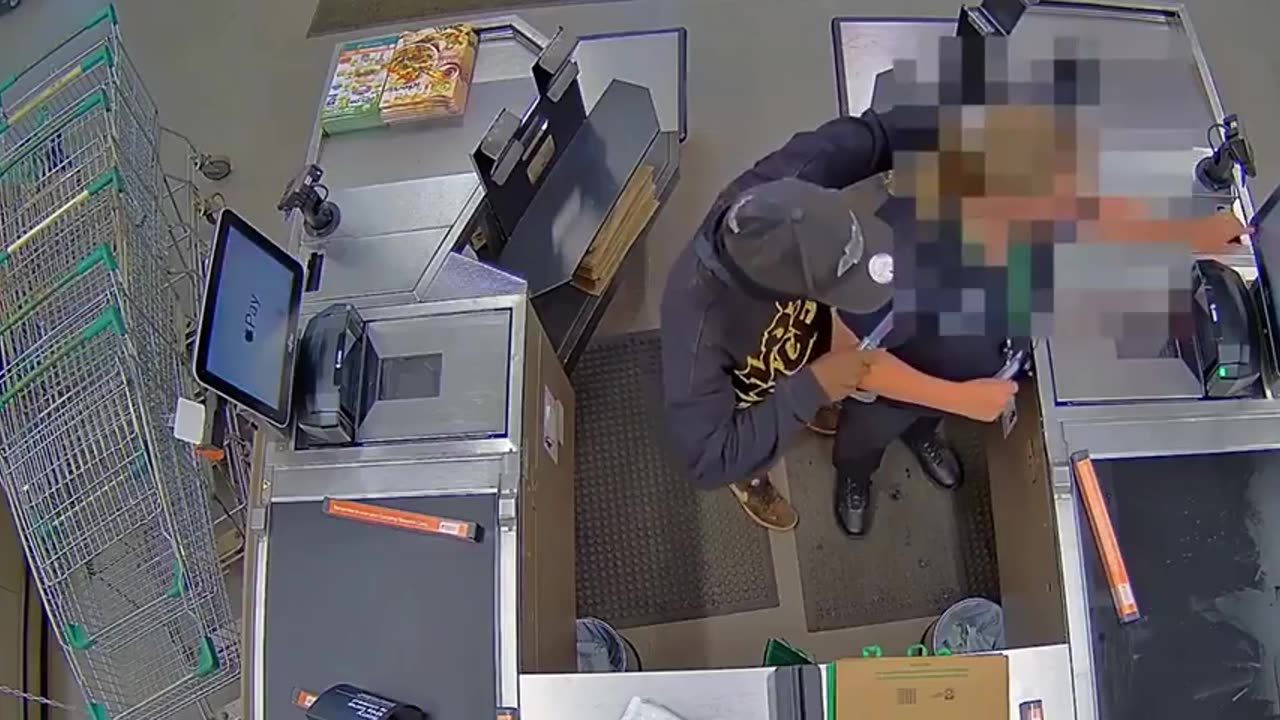 Woolworths worker being robbed at knifepoint by an aboriginal in Western Australia