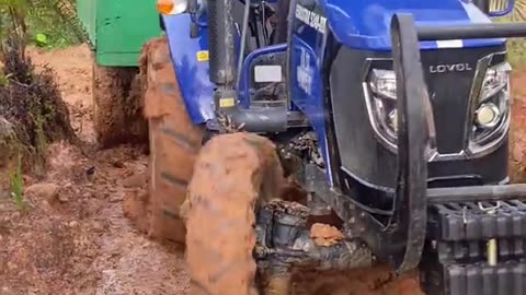 beautiful driver carrying a tractor