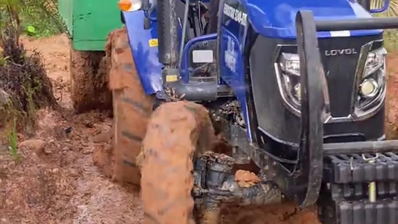 beautiful driver carrying a tractor