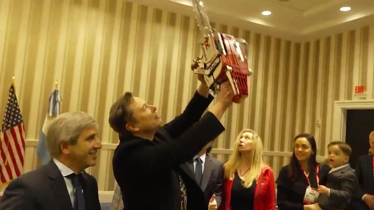 Argentinian President Javier Milei presents Elon Musk with a 'chainsaw for bureaucracy' at CPAC 2025