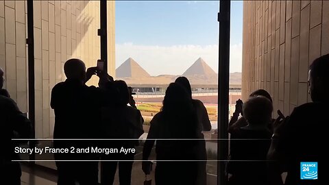 The Grand Cairo Museum visitors so captivated that they fall into water.