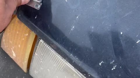 Broken Car Hood Kept Closed With Latches