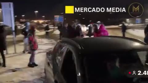 Nick Sortor ran into a protester with his car as they surrounded and attacked it.