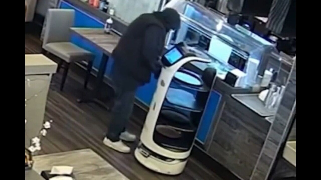 A Degenerate Tries To Steal A Food Delivery Robot In A San Jose Restaurant