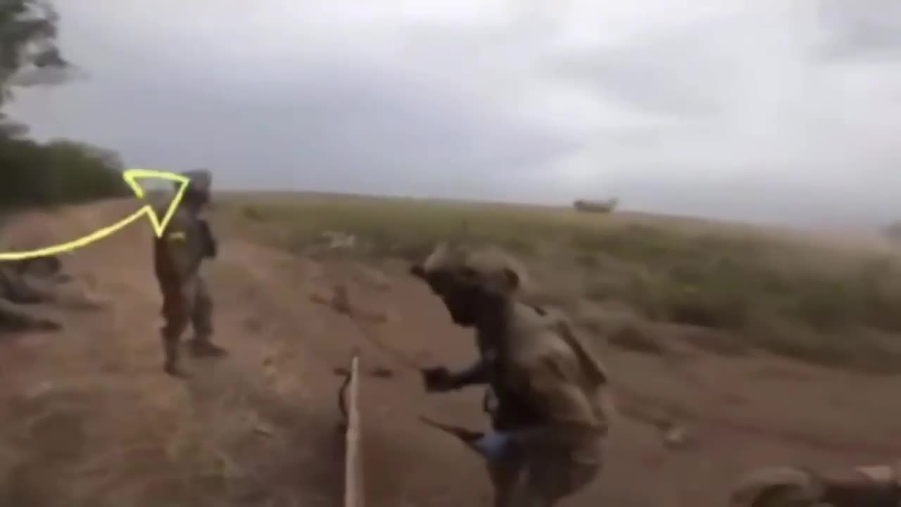 An artillery shell explodes close to Ukrainian soldiers, shrapnel misses the group by ca. 1 meter