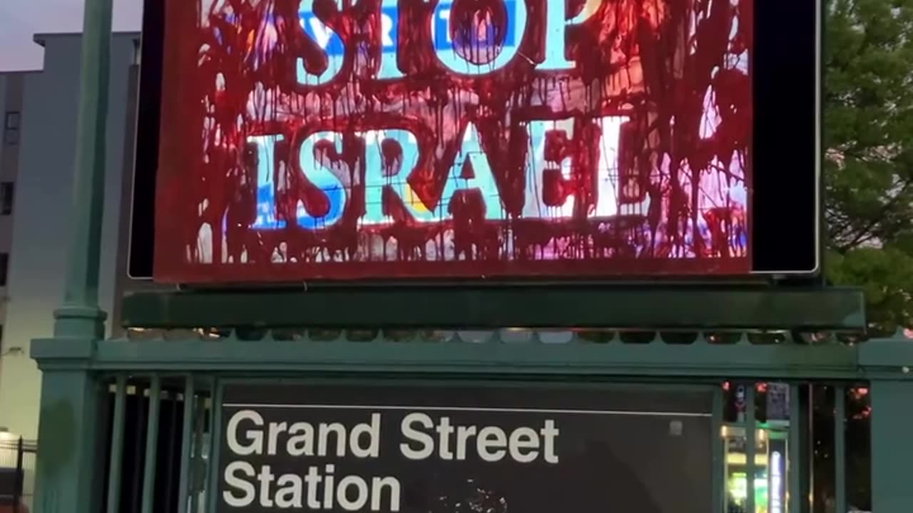 Artwork displayed at New York’s Grand Street subway station carries the words “Stop Israel,” turning public space into a call for justice for Palestine.