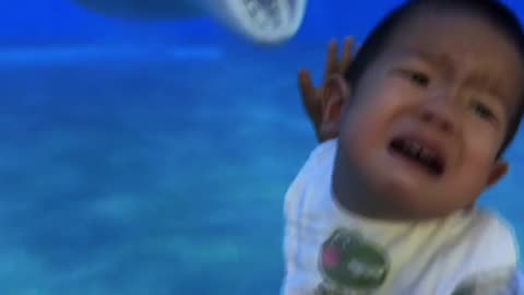 Cute Kid Playing With Big Fish - FunkyPets4u