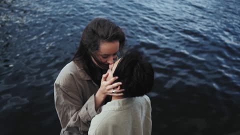 Women Couple Kissing in a Lake, Love knows no bondaries
