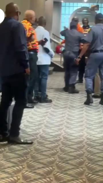 Fist fight: Ivan Barnes fighting with Mbali Shinga's supporters