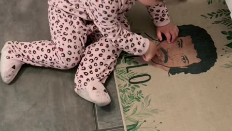Baby Sees Father in Lionel Richie Bath Rug