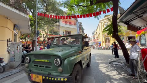 Riding a rickshaw around the Old Quarter in Hanoi, Vietnam