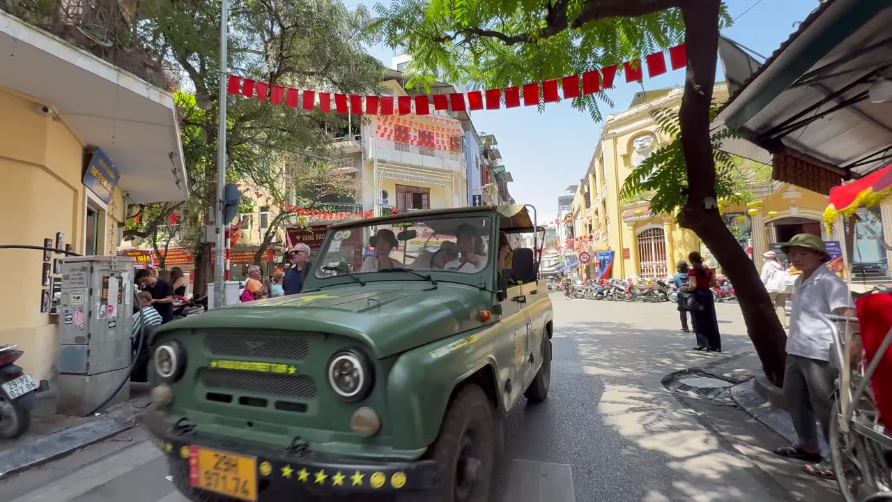 Riding a rickshaw around the Old Quarter in Hanoi, Vietnam