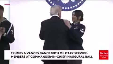 Donald trumph dance with millitary female officers