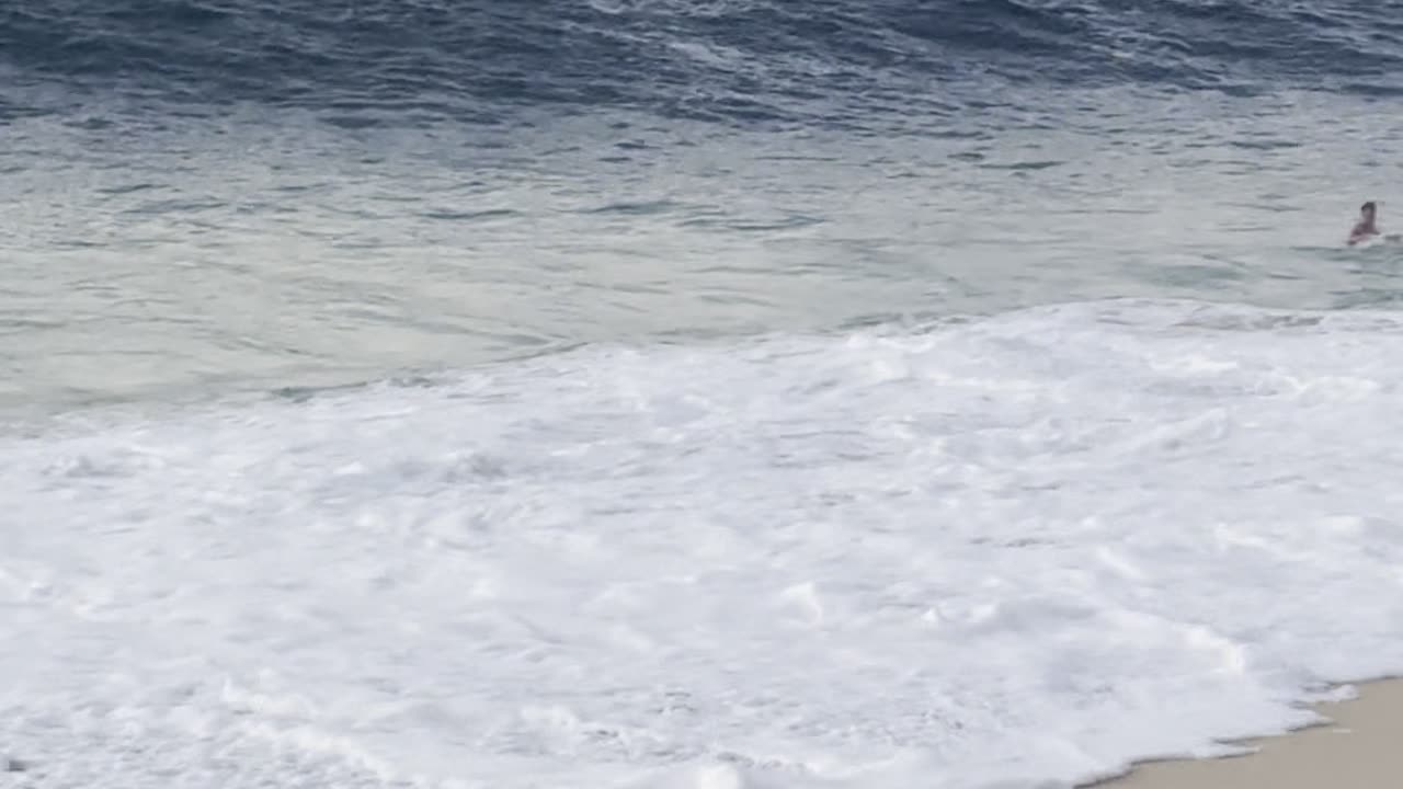 Inner Tube Boy Wipeouts on North Shore Break
