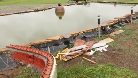 Rainey Day Stone Work For Water Fall, Making Foam Walls & Sealing Under The Water Fall.