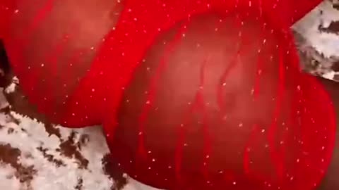 Twerking in Red Fishnets.