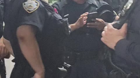NYPD officers protecting war criminal Benjamin Netanyahu.