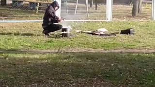 In Kyiv, a Man Cooks on an Open Fire — Just Like Before the Communists…