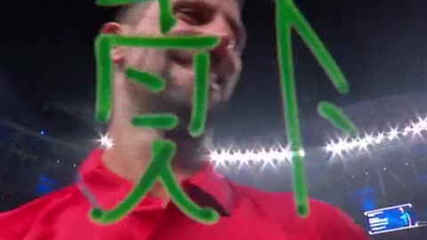 Novak Djokovic Signing The Camera Lens In Shanghai With..