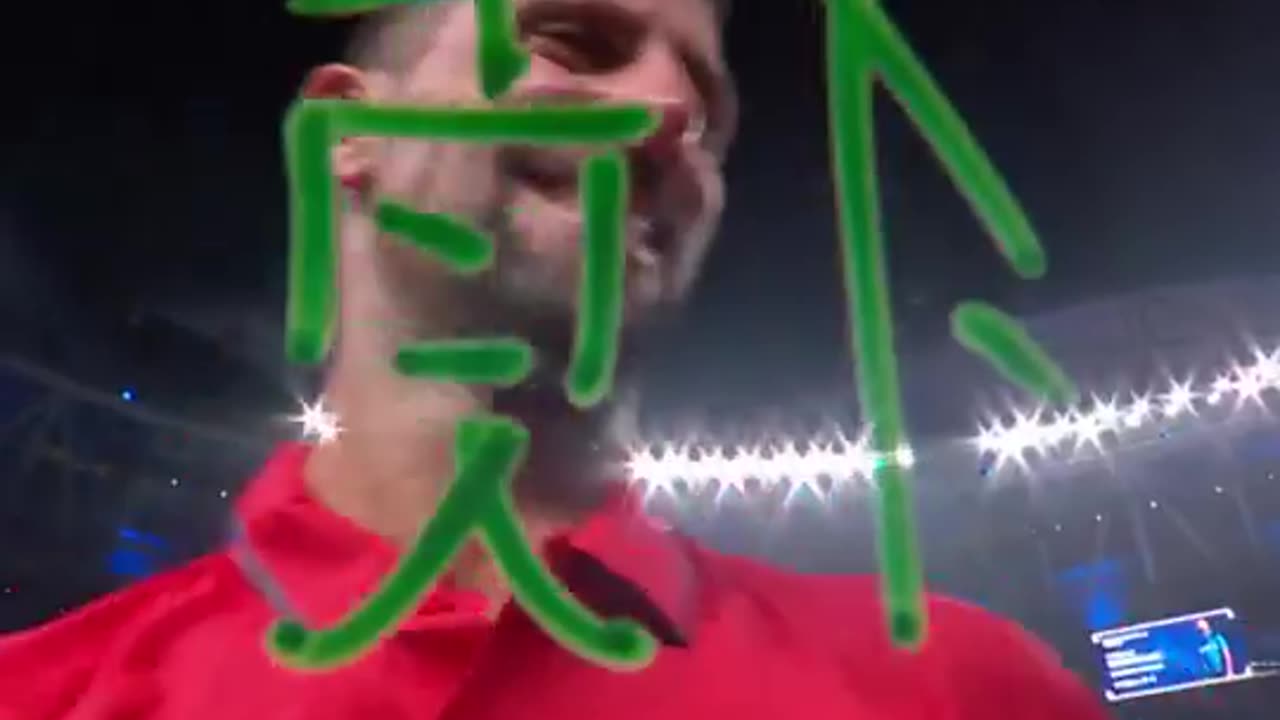 Novak Djokovic Signing The Camera Lens In Shanghai With..