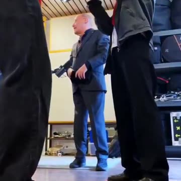 Member of the Bundestag for the far-left party "Linke" wearing a black "Antifa"