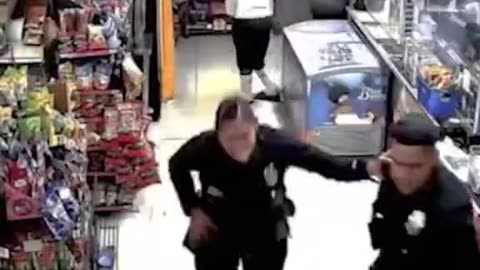 ‘The LAPD released video of a dramatic shootout at a liquor store in Jefferson Park.’