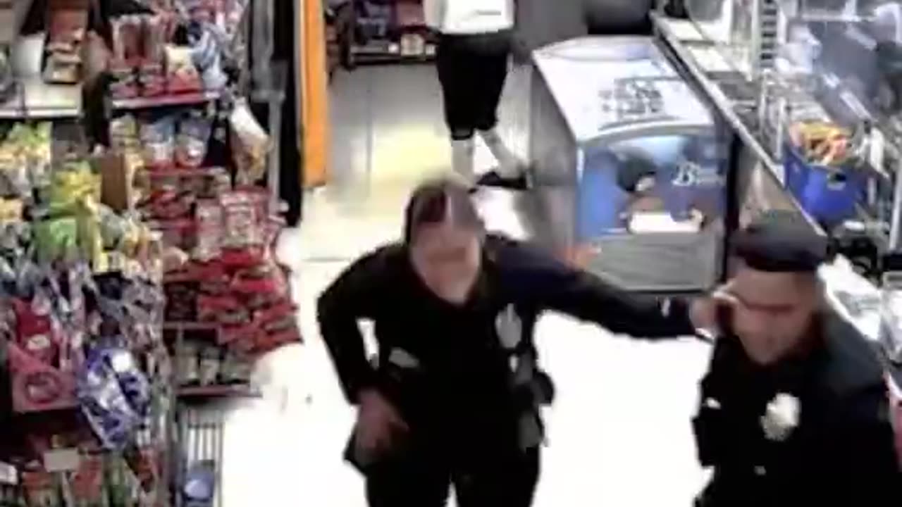 ‘The LAPD released video of a dramatic shootout at a liquor store in Jefferson Park.’