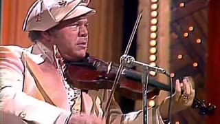 Roy Clark plays "Orange Blossom Special" in 1976.