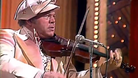 Roy Clark plays "Orange Blossom Special" in 1976.