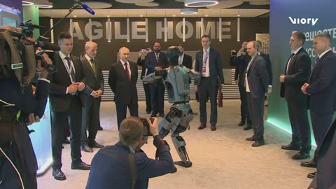 Putin and the dancing robot! Russian president praises 'very beautiful' performance