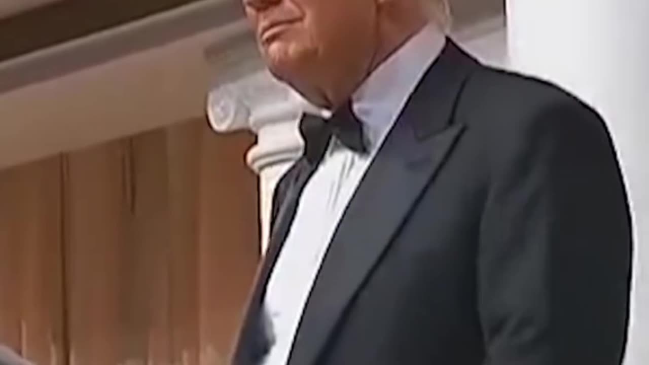 Trump dances witha sword after cutting the cake