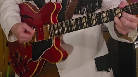 Eddie Money hold on guitar example.