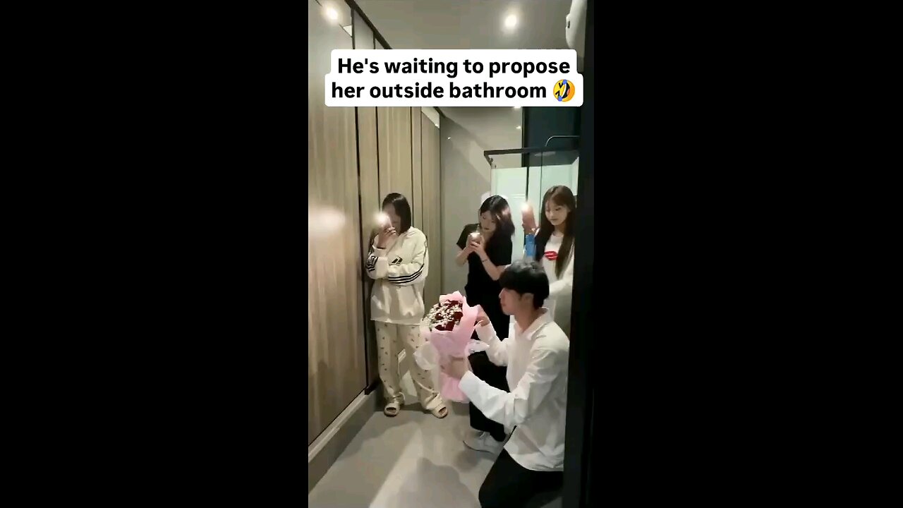 He's Waiting to Propose to Her Outside the Bathroom