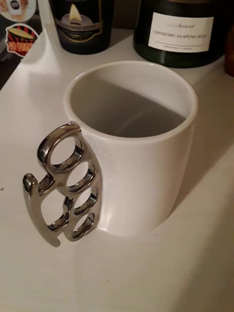 Brass Knucks Coffee Mug