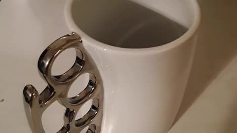 Brass Knucks Coffee Mug