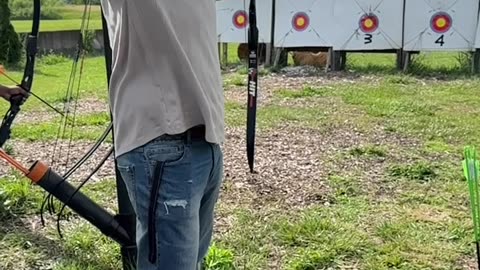 In the quiet of the range, the archer draws his bow… 🏹