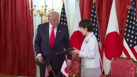 Trump and Japanese PM sign military and trade deals after bilateral meeting.