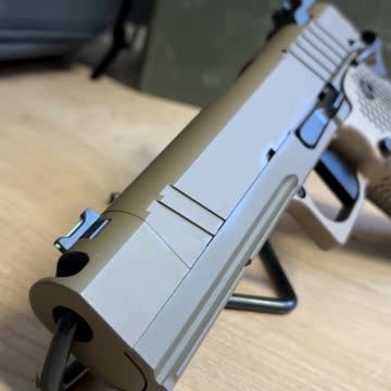 The Nighthawk Custom Sand Hawk 1911: Precision redefined.