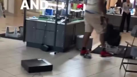 Black destroys store, attacks victims