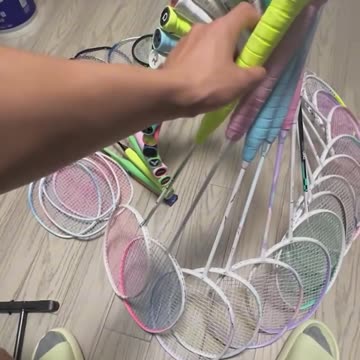 Organizing tennis rackets.hd