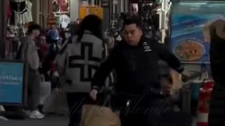 Woman arrested for trying to trip police officer pursuing suspect