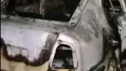 Man Showing Off his Grenade in his Friends Car