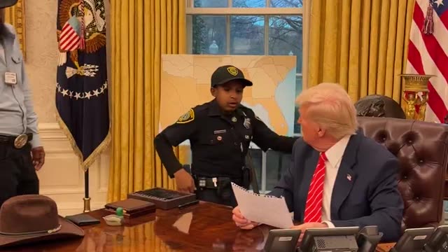 DJ Daniel, newest member of the US Secret Service, meets President Trump in the Oval Office