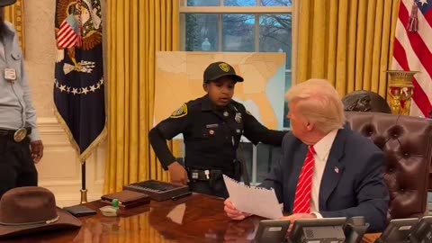 DJ Daniel, newest member of the US Secret Service, meets President Trump in the Oval Office