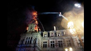 A fire damages a 19th century district town hall in Paris, bell tower at risk of collapsing