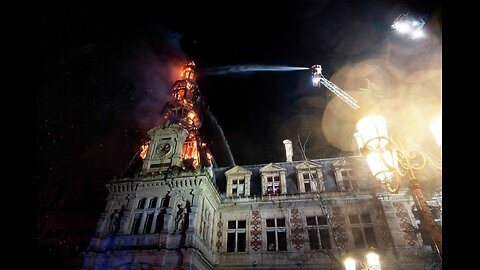 A fire damages a 19th century district town hall in Paris, bell tower at risk of collapsing